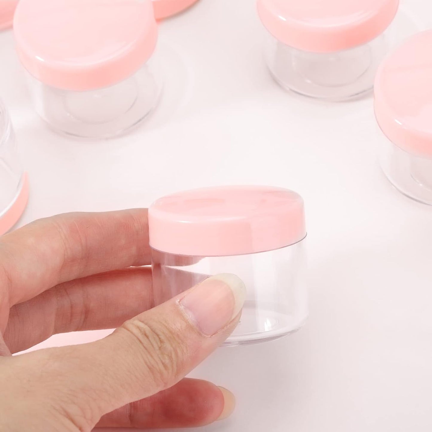 100 Count 20g Sample Containers with Lids,Refillable Cosmetic Containers Small Plastic Jars Lip Scrub Container - Pink